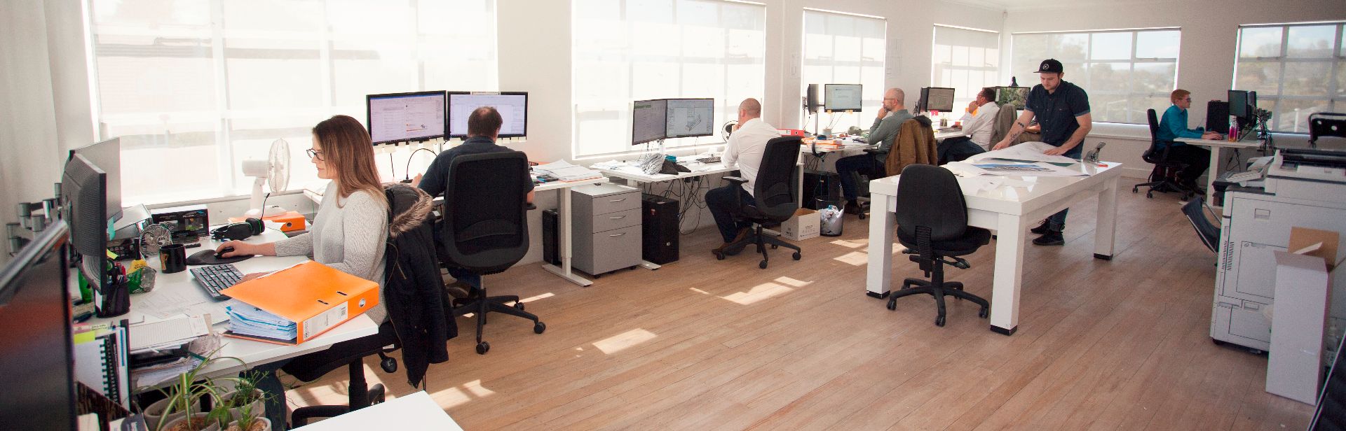 Creative Space employees working in an open office
